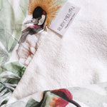 Ruby Melon Cover for Baby Change Mat with leaf flower and bird pattern