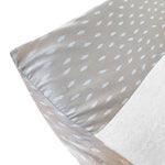 Ruby Melon Cover for Baby Change Mat with white feather pattern on natural beige