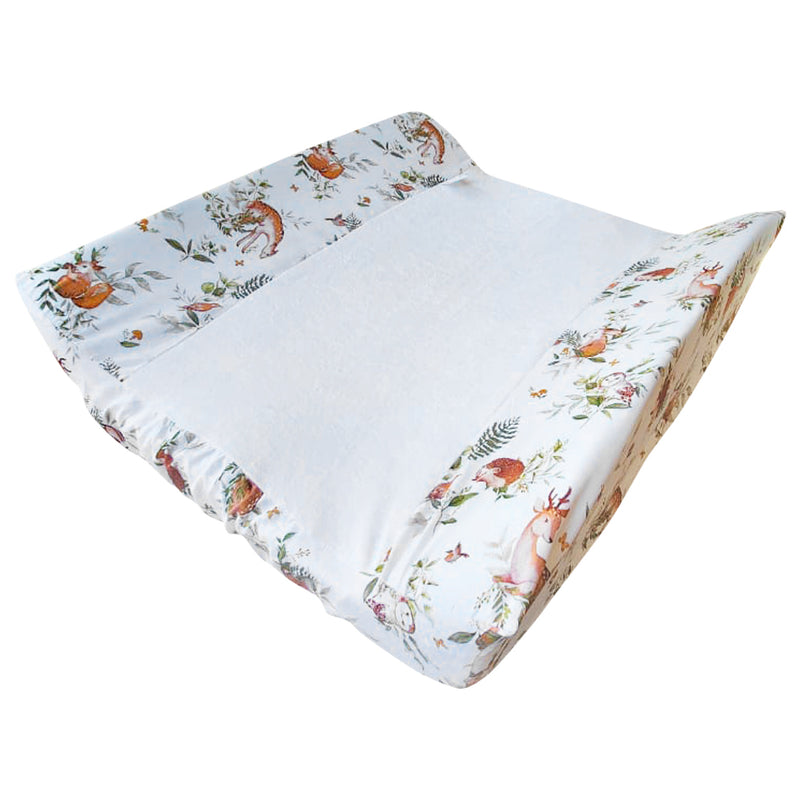 Ruby Melon Cover for Baby Change Mat with woodland theme pattern in subtle brown and green colours
