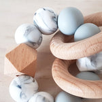 Ruby Melon Silicone Rattle Teether